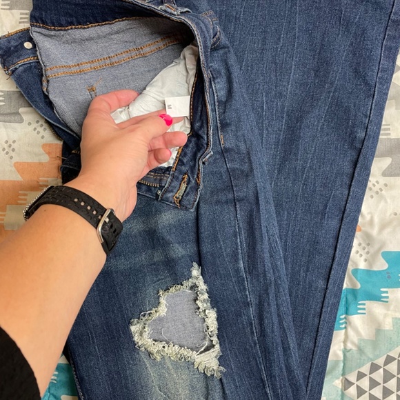 High Rise Distressed Flared Jeans - Picture 4 of 6